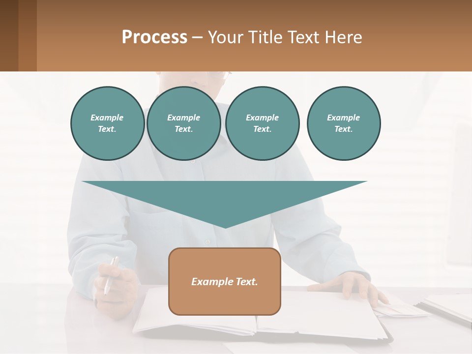 A Man Sitting At A Desk In Front Of A Computer PowerPoint Template