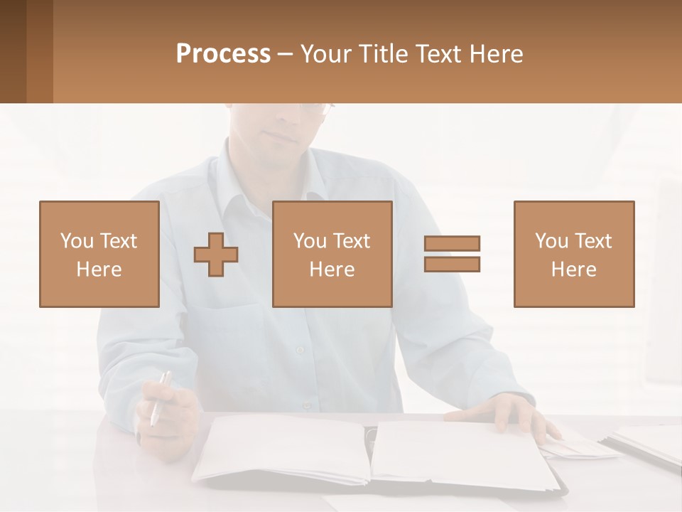 A Man Sitting At A Desk In Front Of A Computer PowerPoint Template