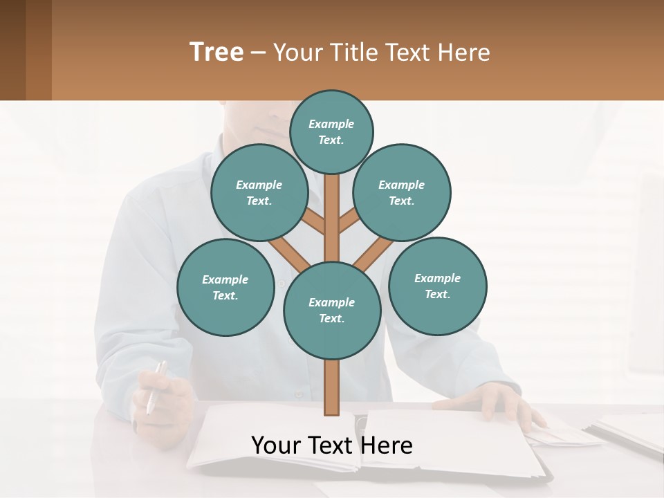 A Man Sitting At A Desk In Front Of A Computer PowerPoint Template