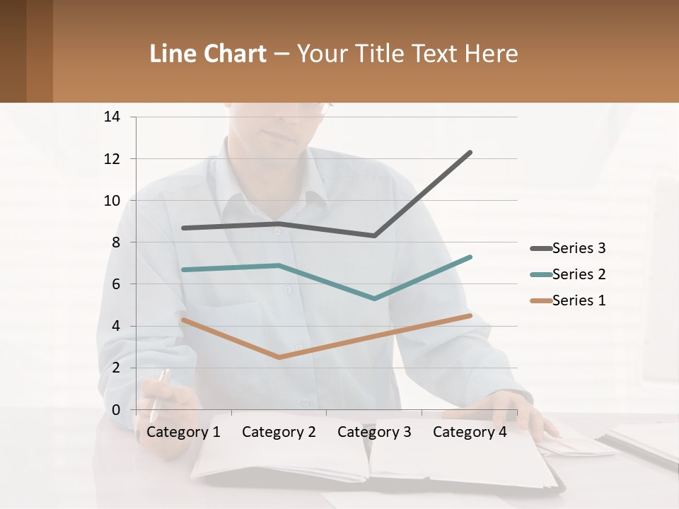 A Man Sitting At A Desk In Front Of A Computer PowerPoint Template