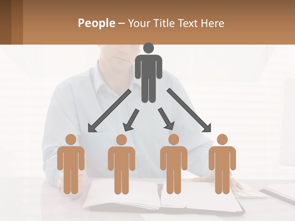 A Man Sitting At A Desk In Front Of A Computer PowerPoint Template