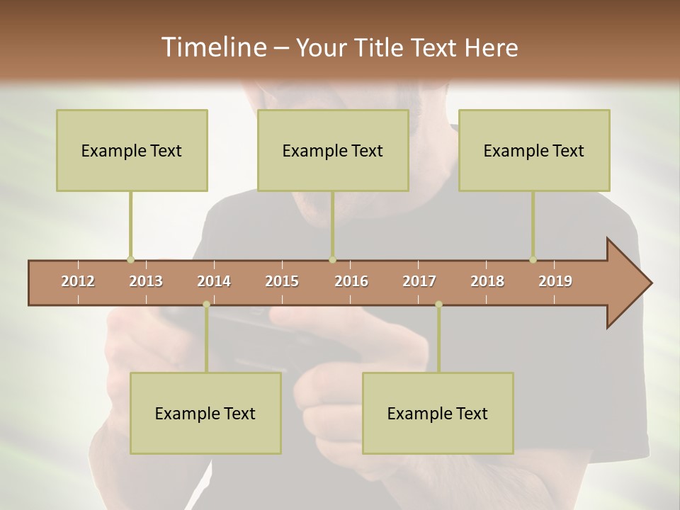 A Man Holding A Remote Control In His Hand PowerPoint Template
