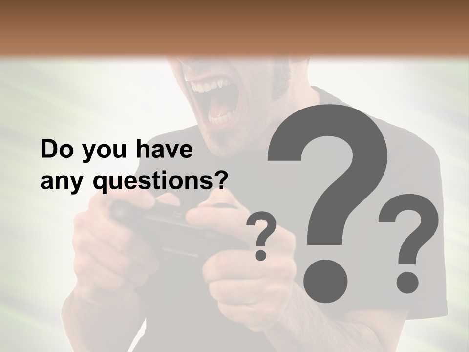 A Man Holding A Remote Control In His Hand PowerPoint Template