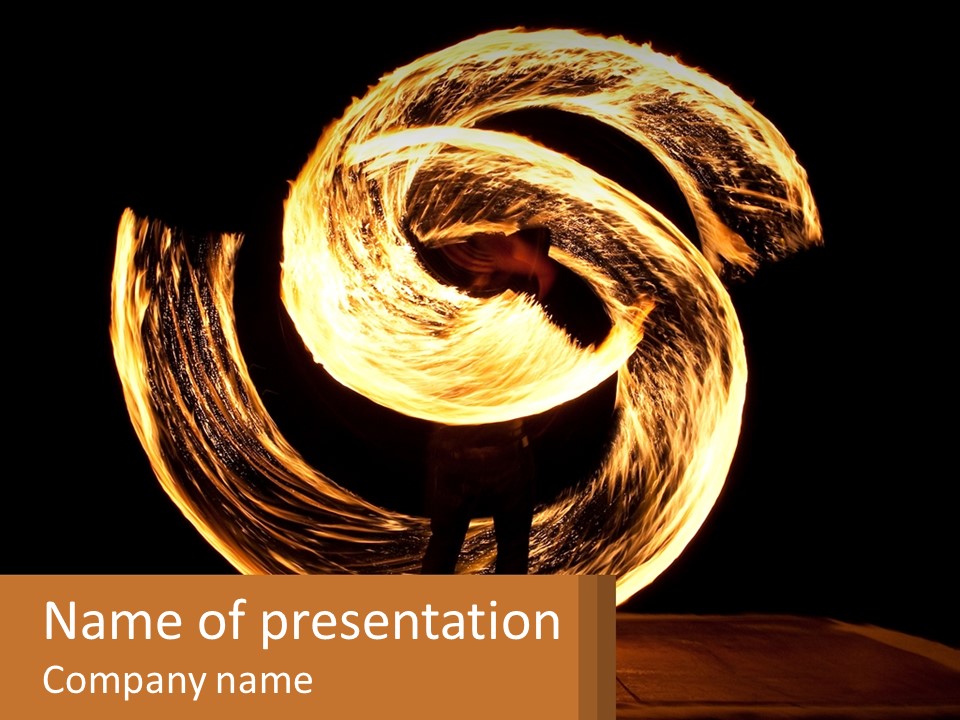 A Person Spinning A Fire With A Black Background PowerPoint Template