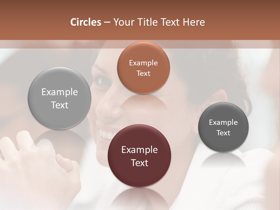 A Woman Sitting At A Table With A Smile On Her Face PowerPoint Template