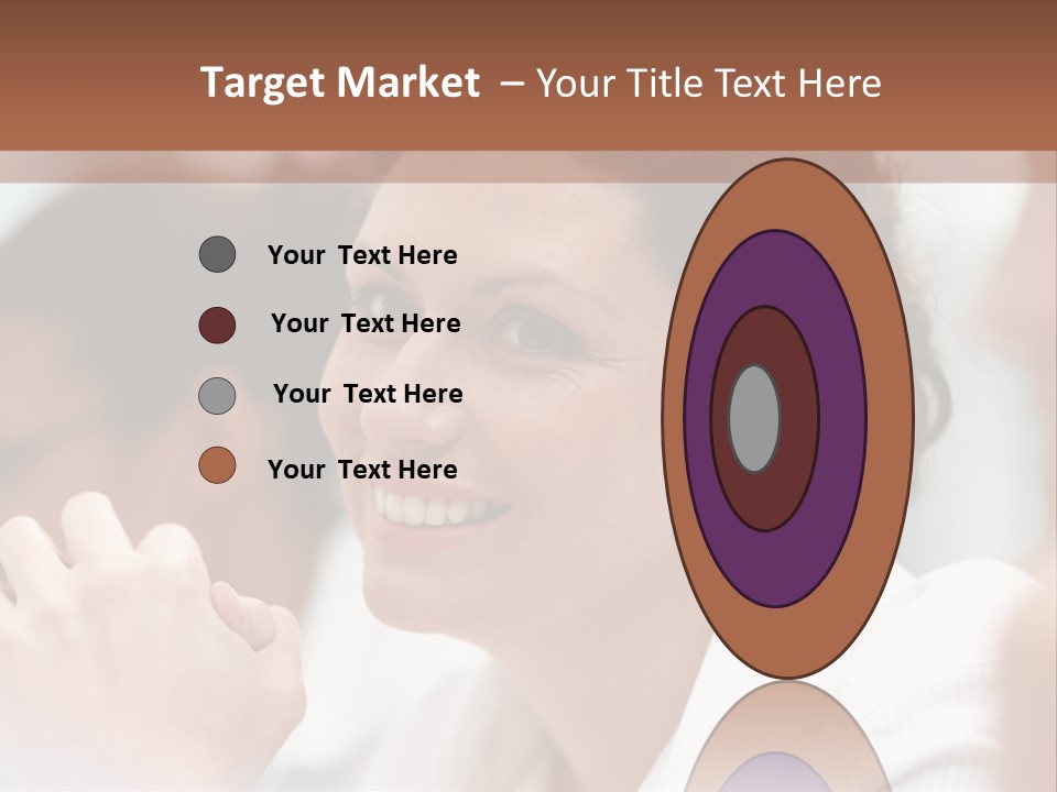 A Woman Sitting At A Table With A Smile On Her Face PowerPoint Template