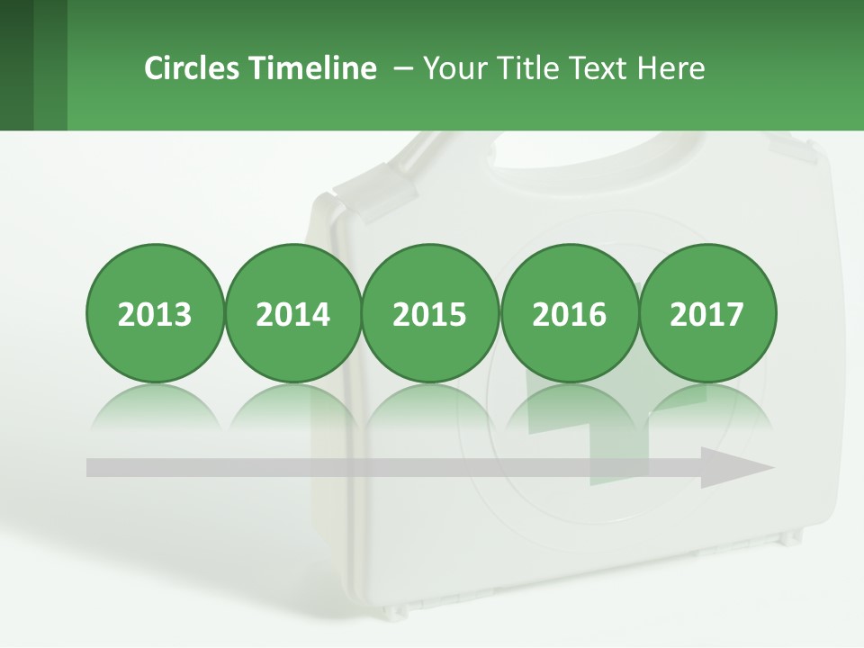 A Medical Kit With A Green Cross On It PowerPoint Template