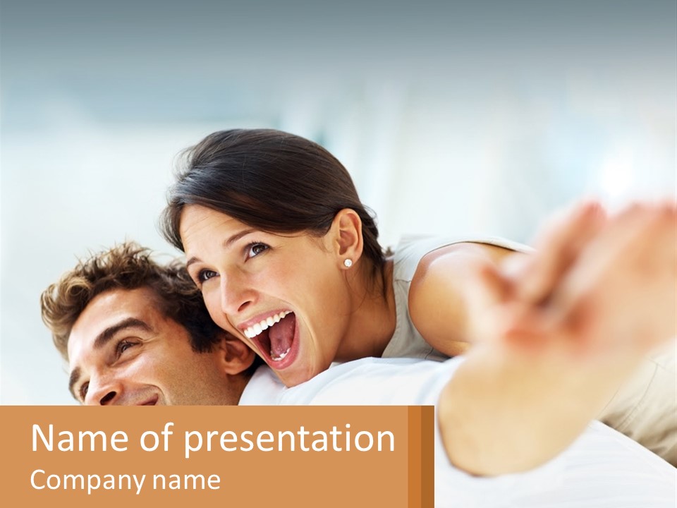 A Man And Woman Laying On A Bed With Their Arms Around Each Other PowerPoint Template