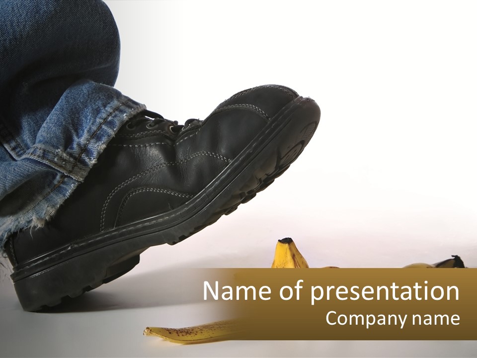 A Person Stepping On A Banana On A White Background PowerPoint Template