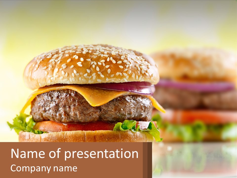 A Hamburger With Cheese And Lettuce On It PowerPoint Template