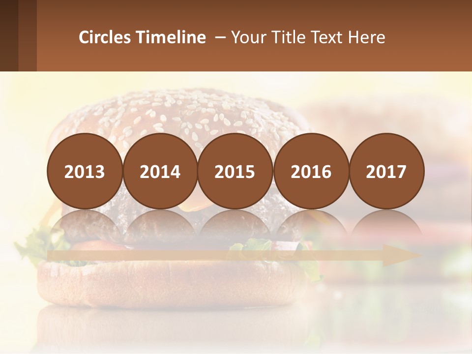 A Hamburger With Cheese And Lettuce On It PowerPoint Template