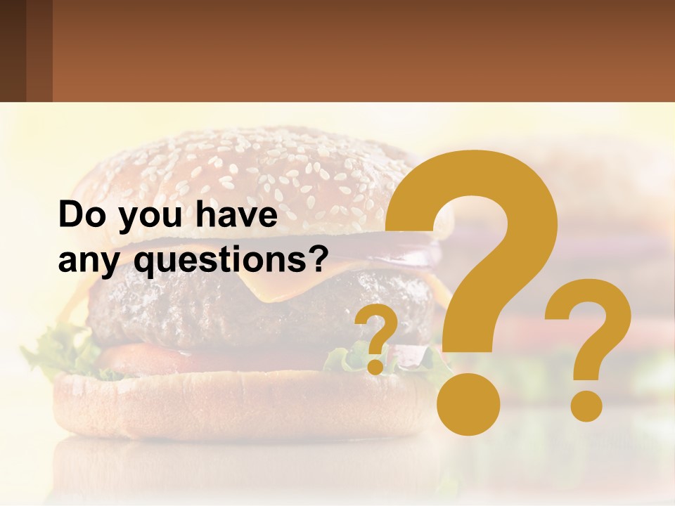 A Hamburger With Cheese And Lettuce On It PowerPoint Template