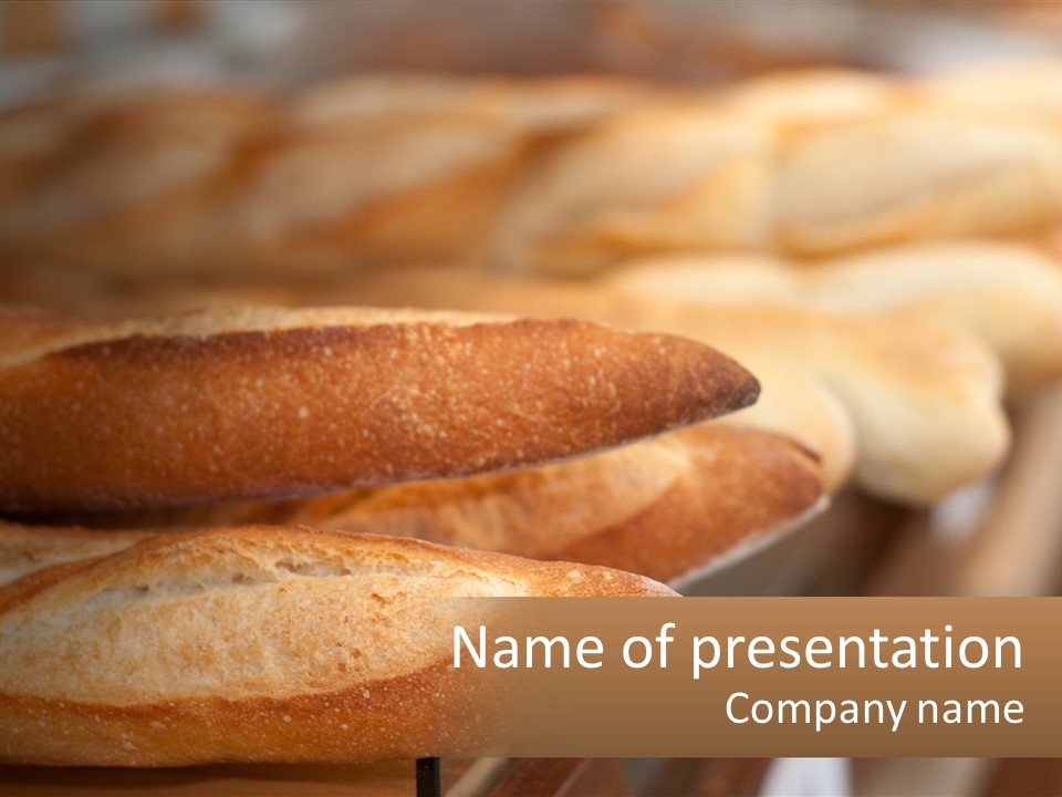 A Bunch Of Breads Sitting On Top Of A Counter PowerPoint Template