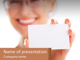 A Woman Holding A Business Card In Her Hand PowerPoint Template
