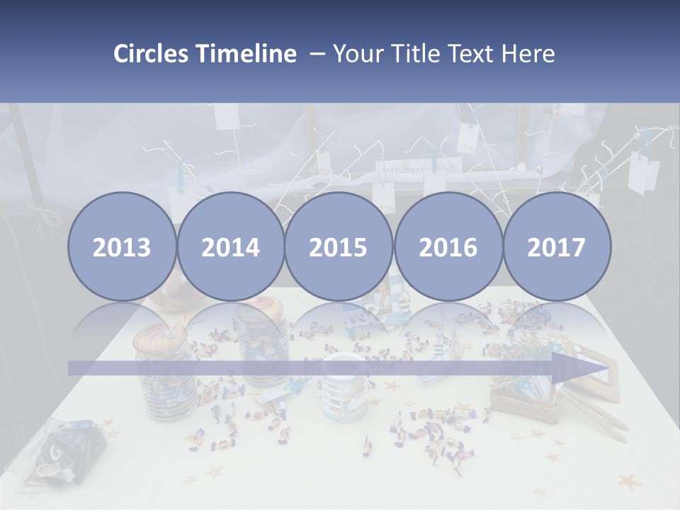 A Table Topped With Lots Of Items On Top Of A White Table PowerPoint Template