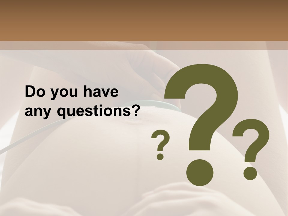 Pregnant Woman Being Examined By A Doctor PowerPoint Template