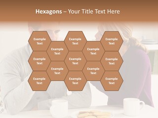 A Man And Woman Sitting At A Table Talking PowerPoint Template