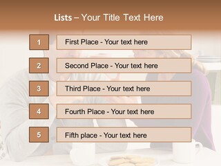A Man And Woman Sitting At A Table Talking PowerPoint Template