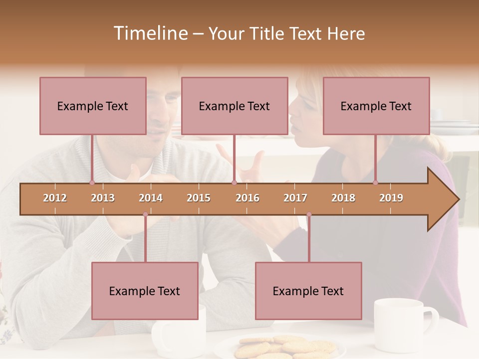 A Man And Woman Sitting At A Table Talking PowerPoint Template