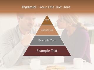 A Man And Woman Sitting At A Table Talking PowerPoint Template