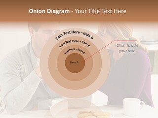 A Man And Woman Sitting At A Table Talking PowerPoint Template