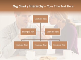 A Man And Woman Sitting At A Table Talking PowerPoint Template