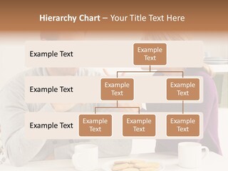 A Man And Woman Sitting At A Table Talking PowerPoint Template