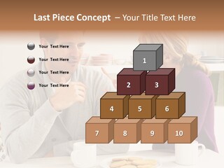 A Man And Woman Sitting At A Table Talking PowerPoint Template