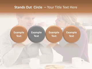 A Man And Woman Sitting At A Table Talking PowerPoint Template