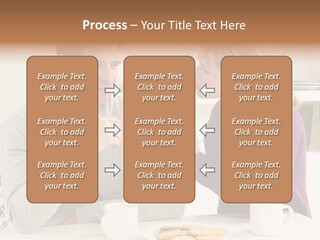 A Man And Woman Sitting At A Table Talking PowerPoint Template
