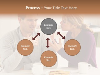A Man And Woman Sitting At A Table Talking PowerPoint Template