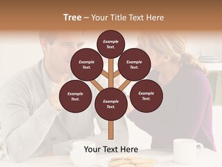 A Man And Woman Sitting At A Table Talking PowerPoint Template