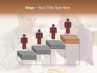 A Man And Woman Sitting At A Table Talking PowerPoint Template