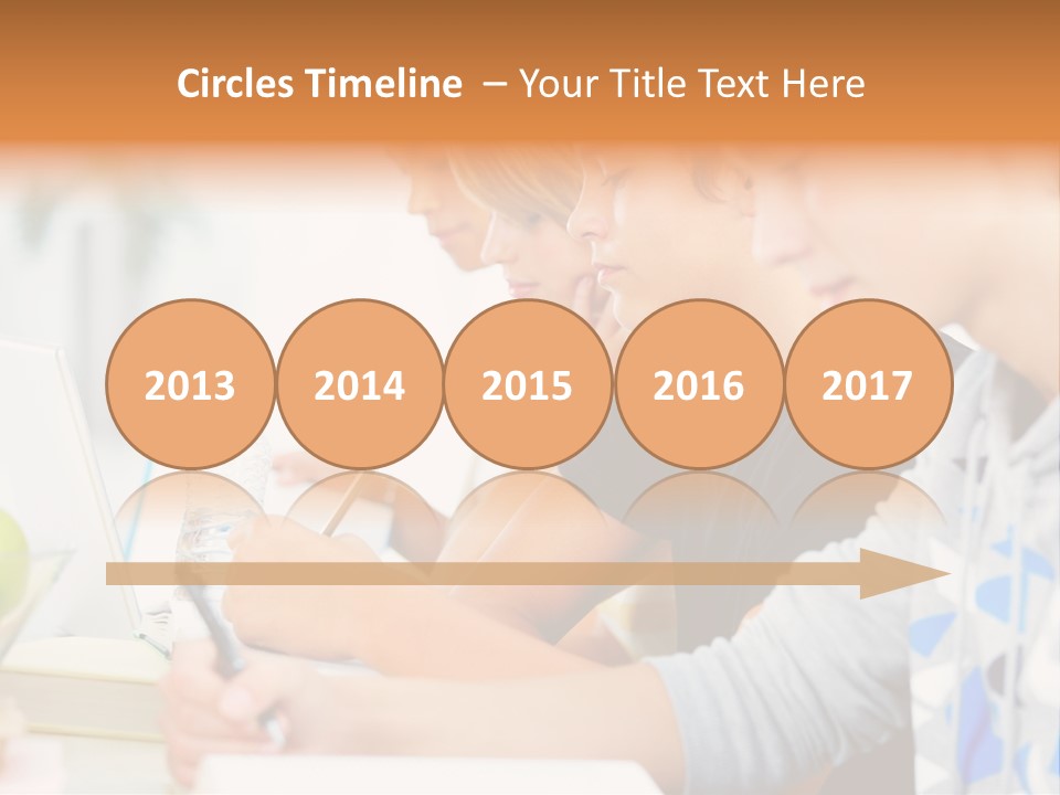 A Group Of People Sitting At A Table With A Laptop PowerPoint Template