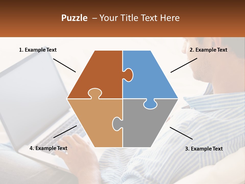 A Man Sitting On A Couch Using A Laptop Computer PowerPoint Template