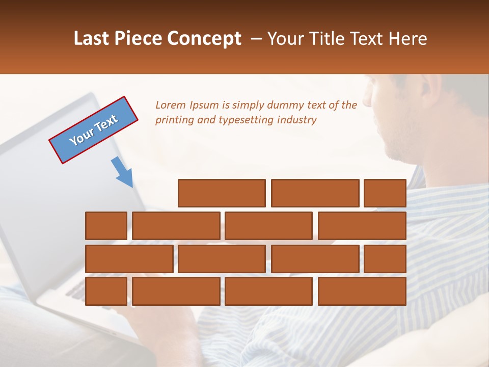 A Man Sitting On A Couch Using A Laptop Computer PowerPoint Template