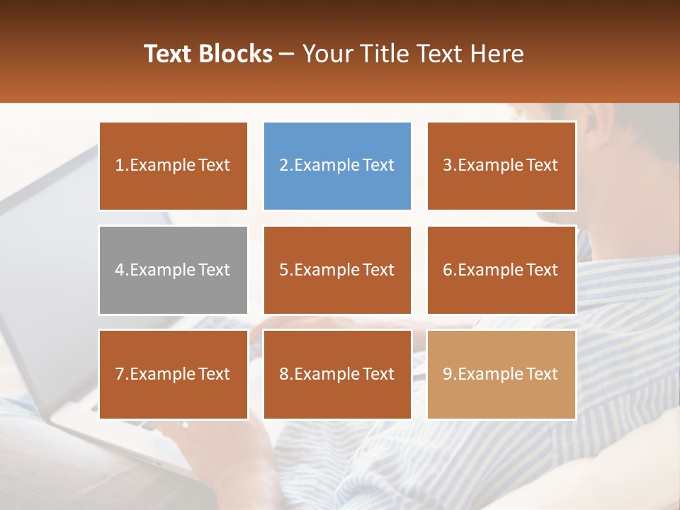 A Man Sitting On A Couch Using A Laptop Computer PowerPoint Template