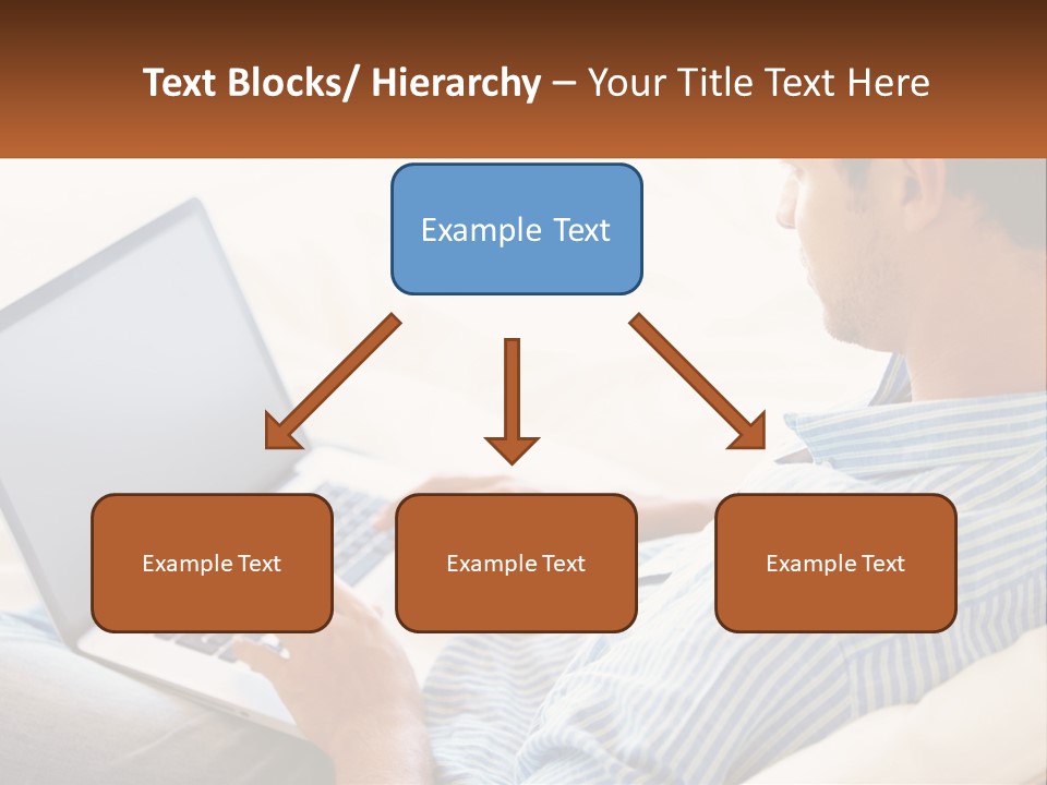 A Man Sitting On A Couch Using A Laptop Computer PowerPoint Template