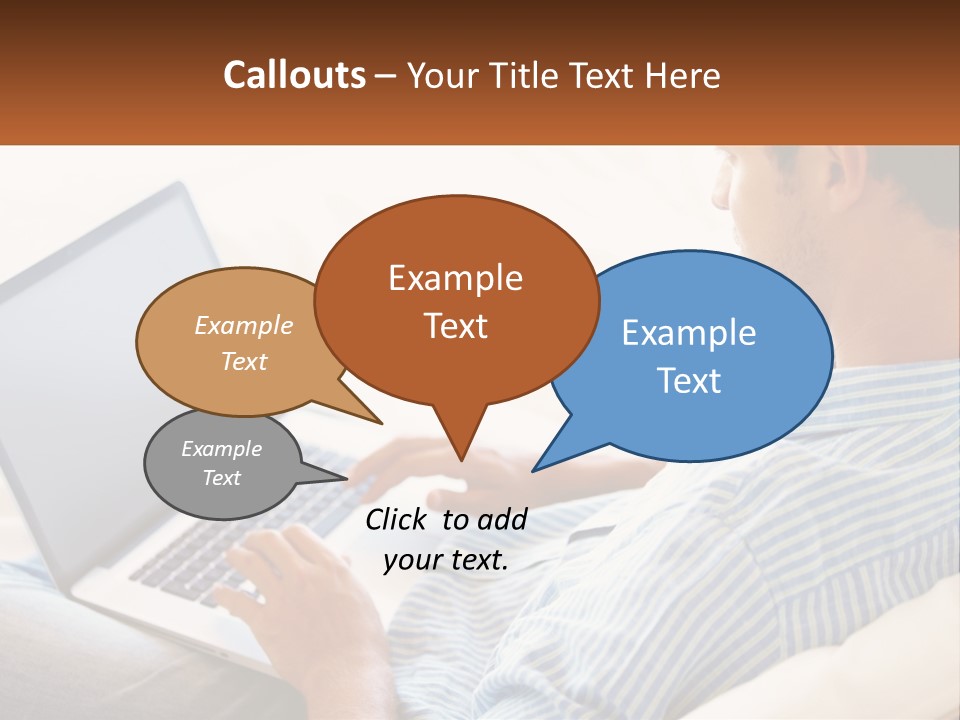 A Man Sitting On A Couch Using A Laptop Computer PowerPoint Template