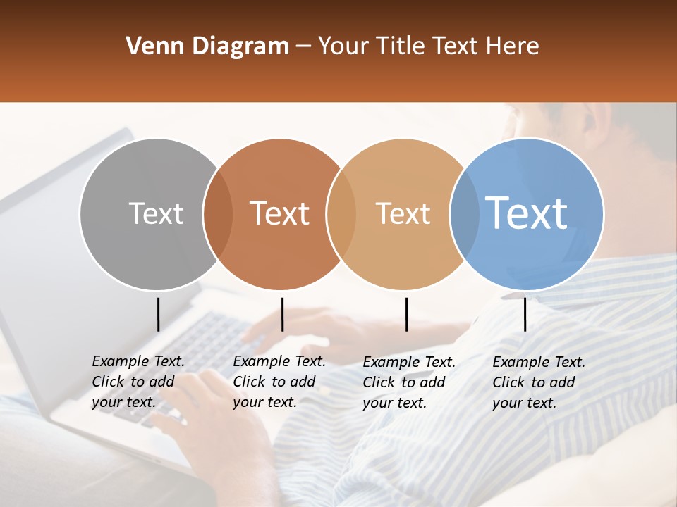 A Man Sitting On A Couch Using A Laptop Computer PowerPoint Template