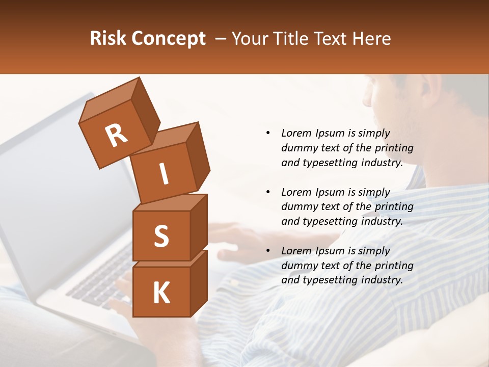 A Man Sitting On A Couch Using A Laptop Computer PowerPoint Template