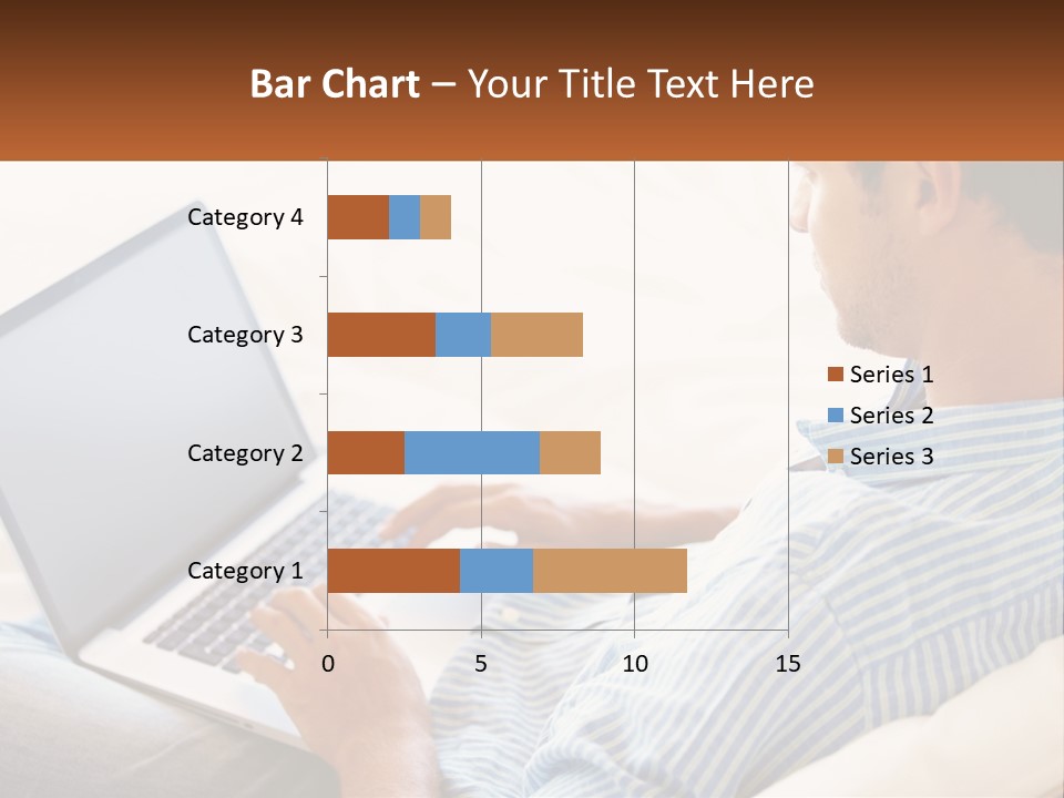 A Man Sitting On A Couch Using A Laptop Computer PowerPoint Template