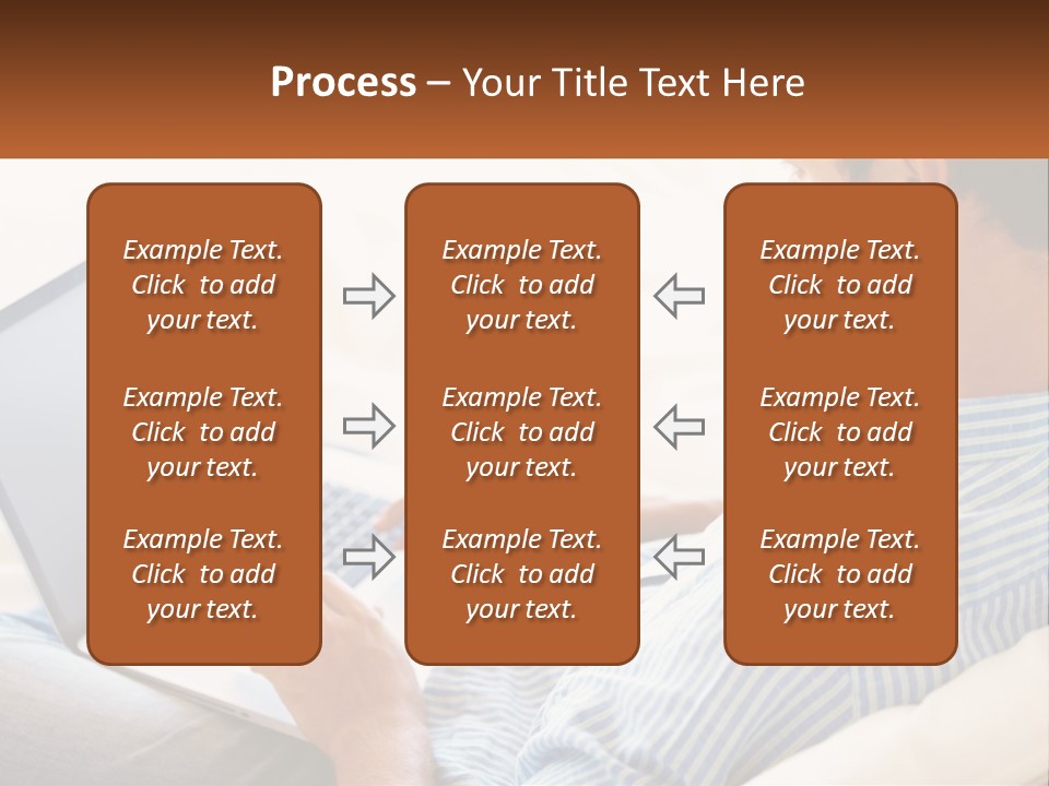 A Man Sitting On A Couch Using A Laptop Computer PowerPoint Template