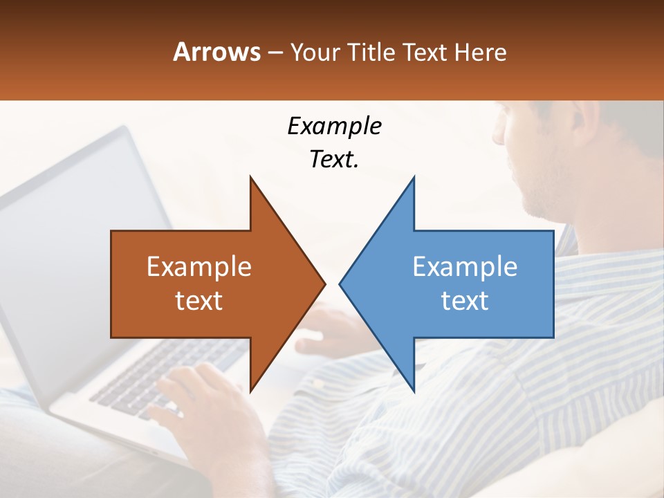 A Man Sitting On A Couch Using A Laptop Computer PowerPoint Template