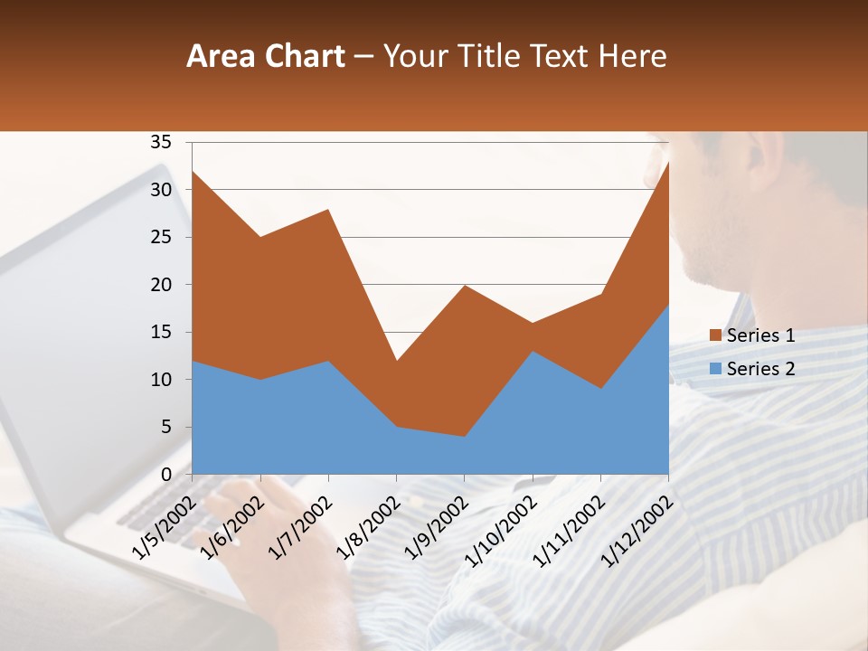 A Man Sitting On A Couch Using A Laptop Computer PowerPoint Template