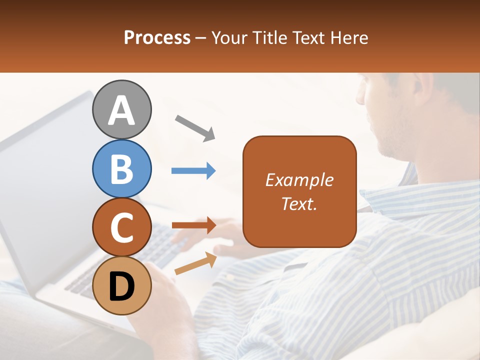 A Man Sitting On A Couch Using A Laptop Computer PowerPoint Template
