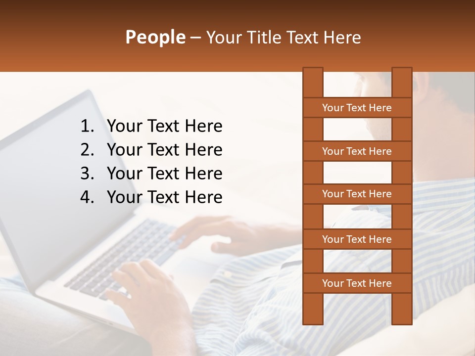 A Man Sitting On A Couch Using A Laptop Computer PowerPoint Template