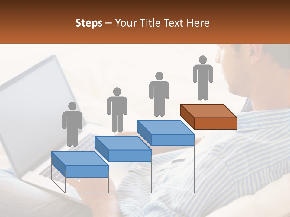 A Man Sitting On A Couch Using A Laptop Computer PowerPoint Template