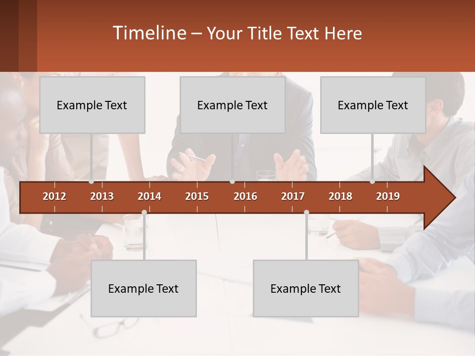 A Group Of People Sitting Around A Table Talking PowerPoint Template