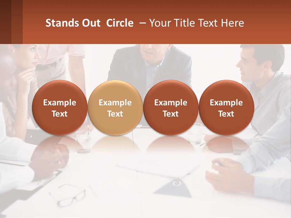 A Group Of People Sitting Around A Table Talking PowerPoint Template